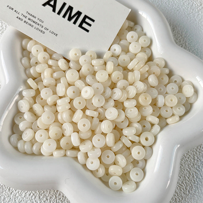 Natural Bodhi Spacer Beads (7x3mm)